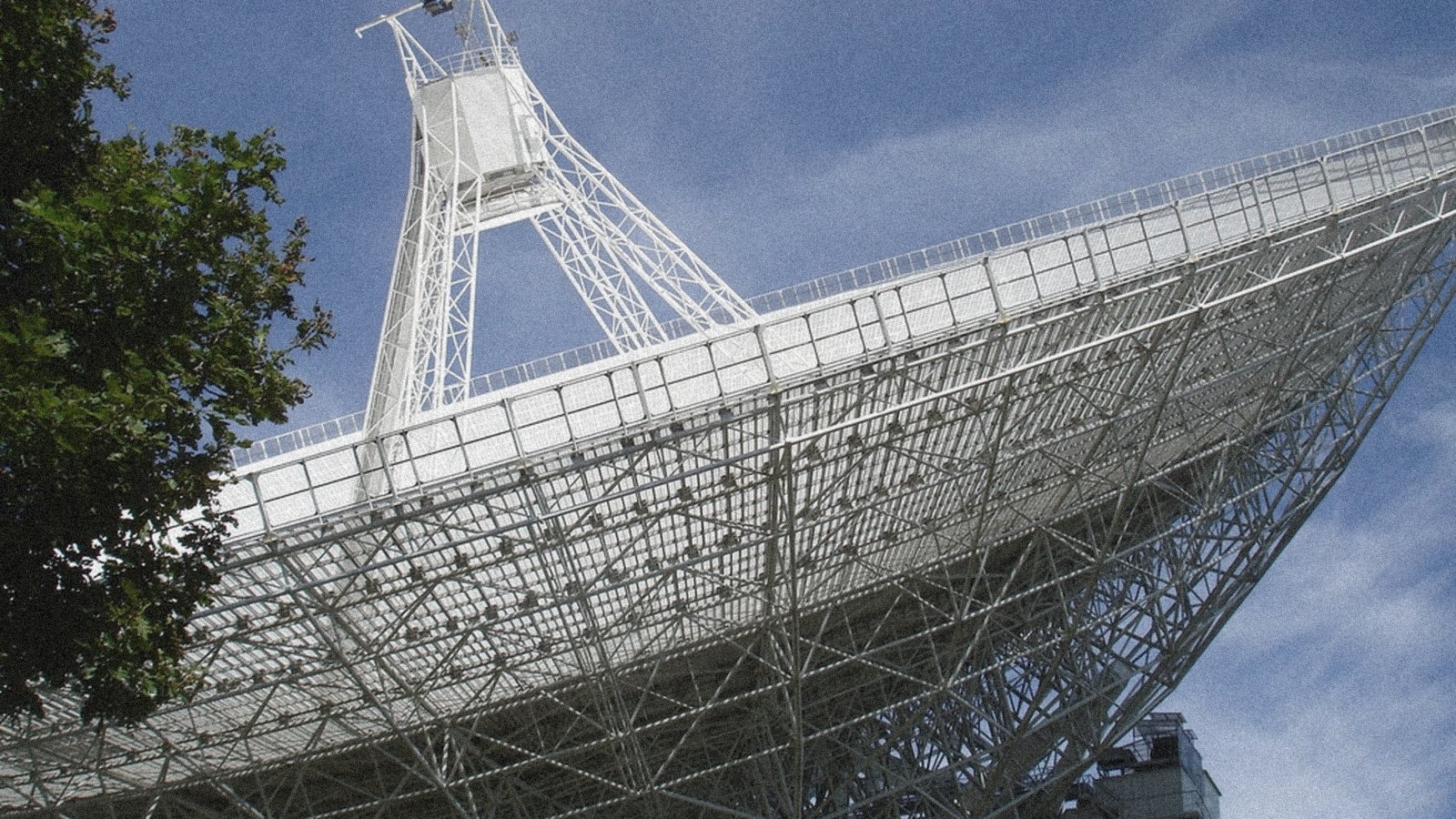 A radio telescope dish against the sky