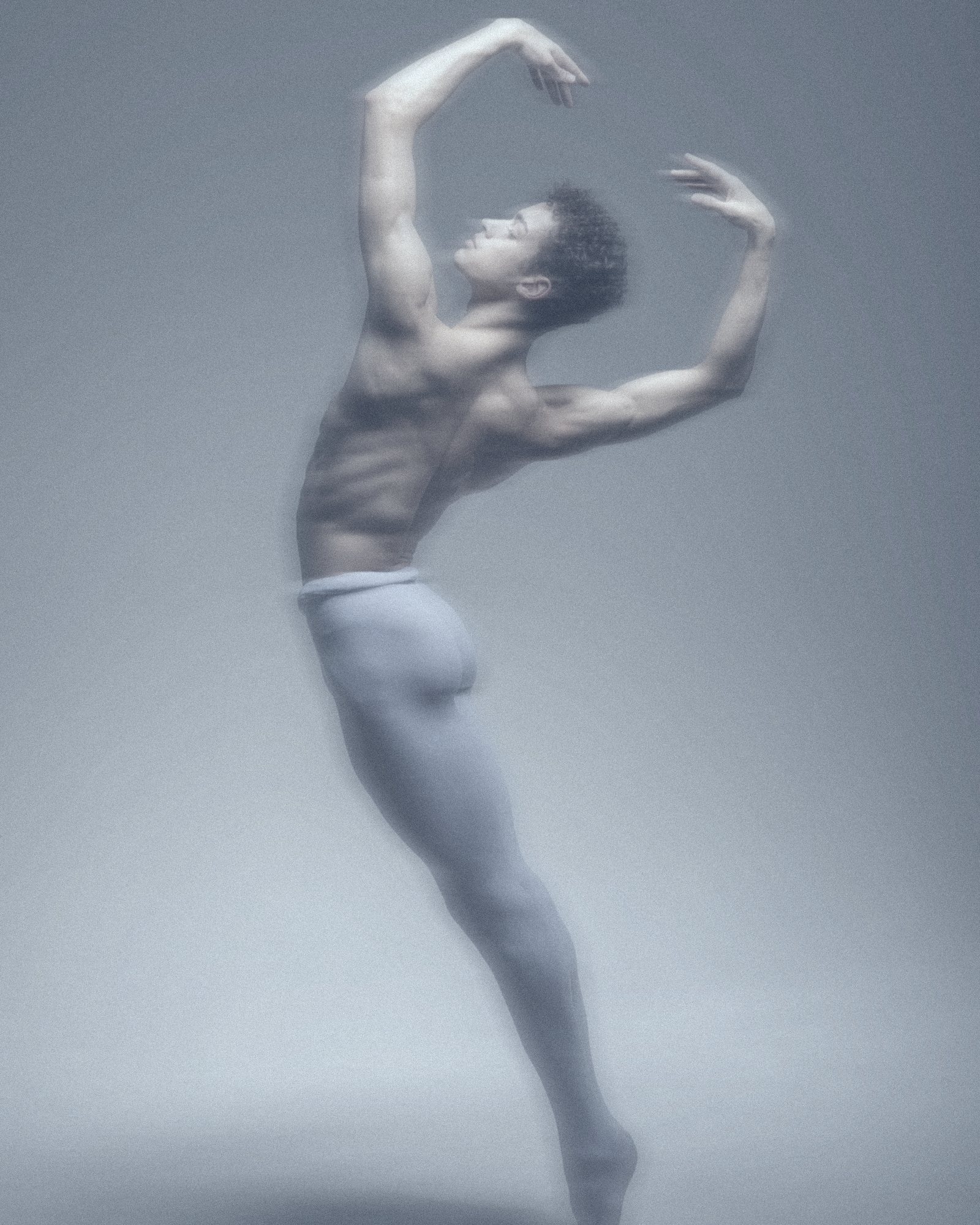 Dancer in blue motion blur